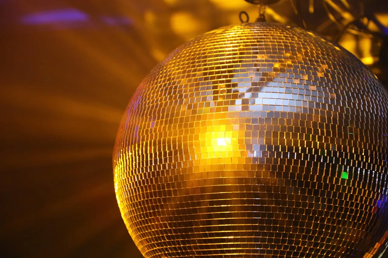 Disco ball party atmosphere with instant photo sharing for celebrations